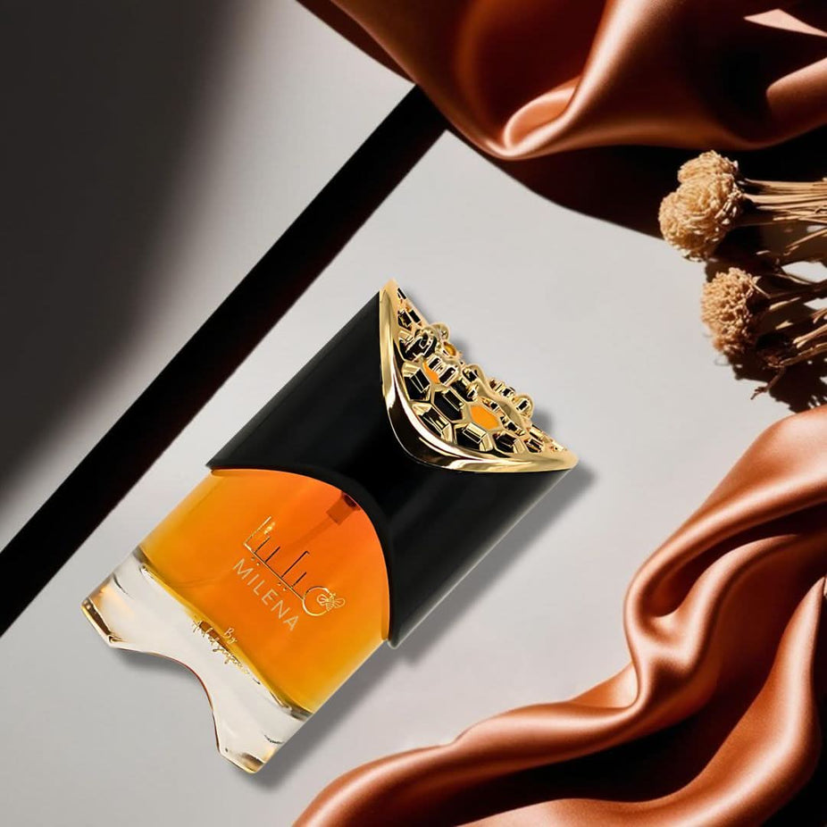 Milena Eau de Parfum spray by Ard Al Zaafaran, 100ml bottle, elegant design with the perfume bottle visible.