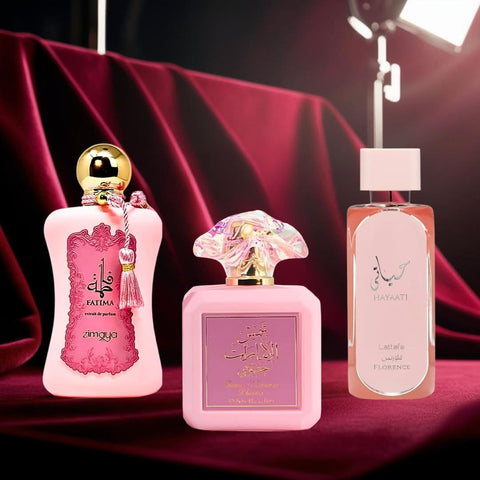 Bundle of three 100ml Eau de Parfums including Pink Blush by Ard Al Zaafaran, Hayaati Florence by Lattafa, and Fatima Pink by Zimaya.