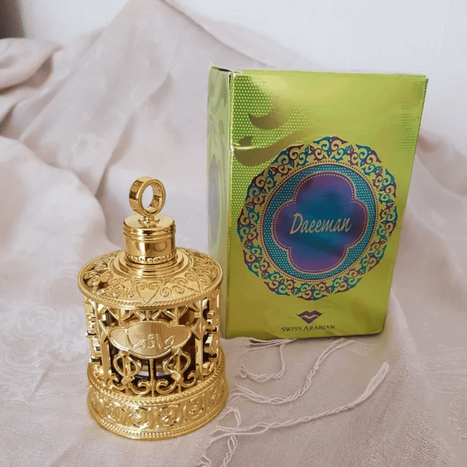 Daeeman perfume oil by Swiss Arabian in a 24 ML bottle, showcasing the elegant glass container and branding label.