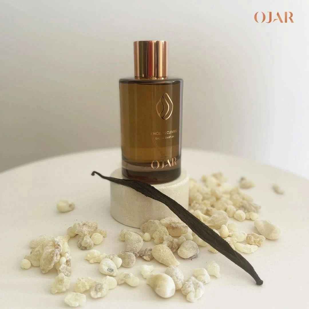 Ojar Encens Cuivre Eau De Parfum 100ml bottle with a sleek design, showcasing the elegant fragrance packaging.