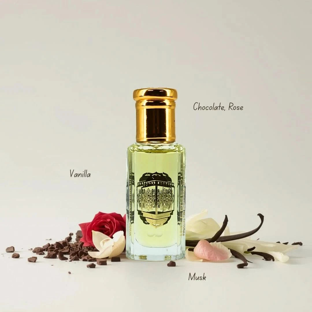 Intense Oud Rouje Madawi and Vanilla Musk perfume oils bundle, 12ml each, featuring elegant glass bottles with floral and musk scents.