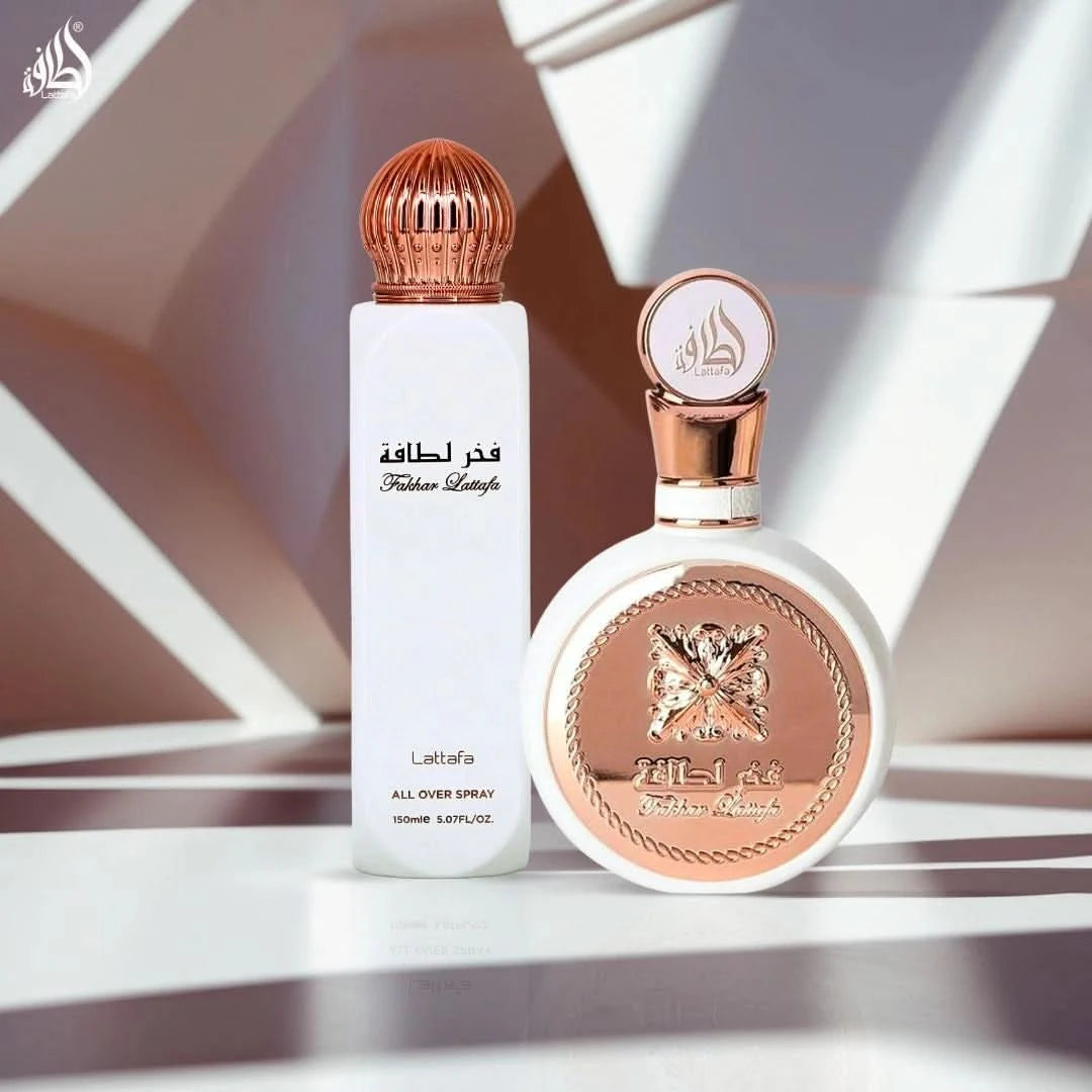 Lattafa Fakhar Women Eau de Parfum 100ml and All Over Spray 150ml bundle, featuring elegant fragrance bottles.