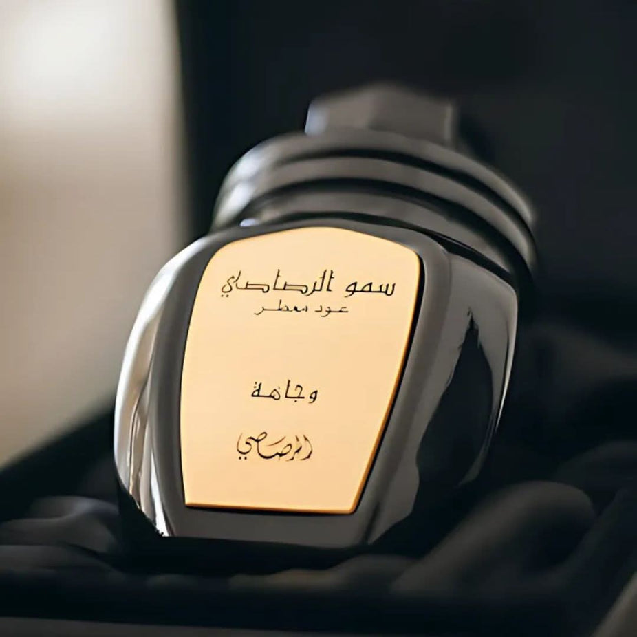 Rasasi Somow Al Rasasi Ma’ali Oudh Moattar Bakhoor 50g in a decorative jar, showcasing fragrant traditional Arabian incense.