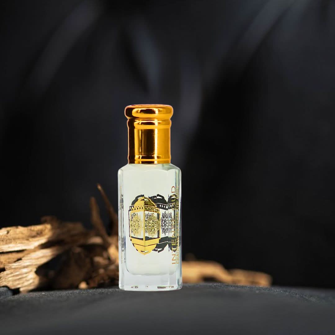 Intense Oud Musk Abiyad perfume oil 12ml in a sleek black gift box, featuring a luxurious loose oil fragrance.