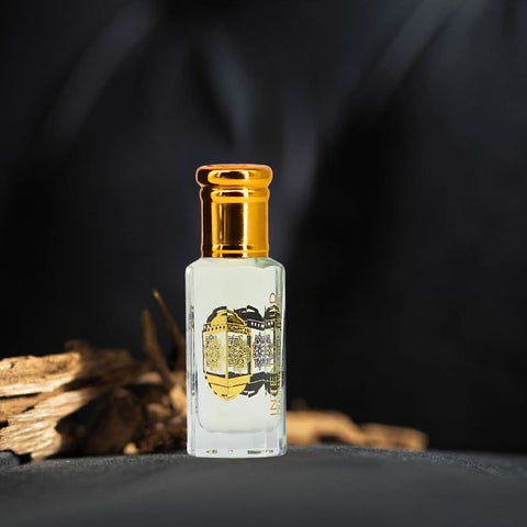 Intense Oud Musk Abiyad perfume oil 12ml in a sleek black gift box, featuring a luxurious loose oil fragrance.