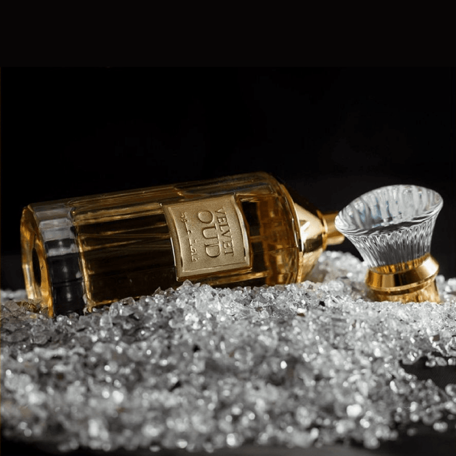 Velvet Oud Eau De Parfum by Lattafa, 100ML bottle with a sleek black and gold design, showcasing the luxurious fragrance packaging.