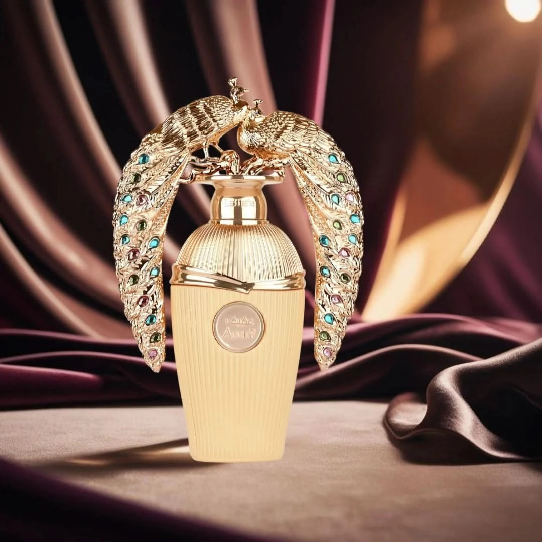 Lattafa Afeef Eau De Parfum Spray 100ml with velvet pouch, elegant glass bottle showcasing the fragrance and branding.