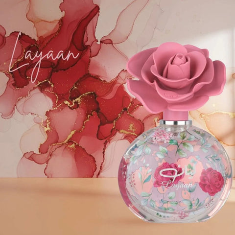 Lattafa Layaan Eau de Parfum Spray 75ml with a velvet pouch, showcasing the elegant bottle design and packaging.
