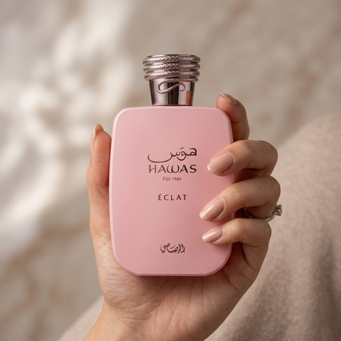 Rasasi Hawas For Her Eclat Eau de Parfum spray 100ml bottle with elegant packaging and floral design.