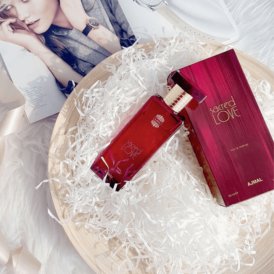 Ajmal Sacred Love for Women EDP 50ml bottle with elegant floral design, showcasing a luxurious fragrance for women.