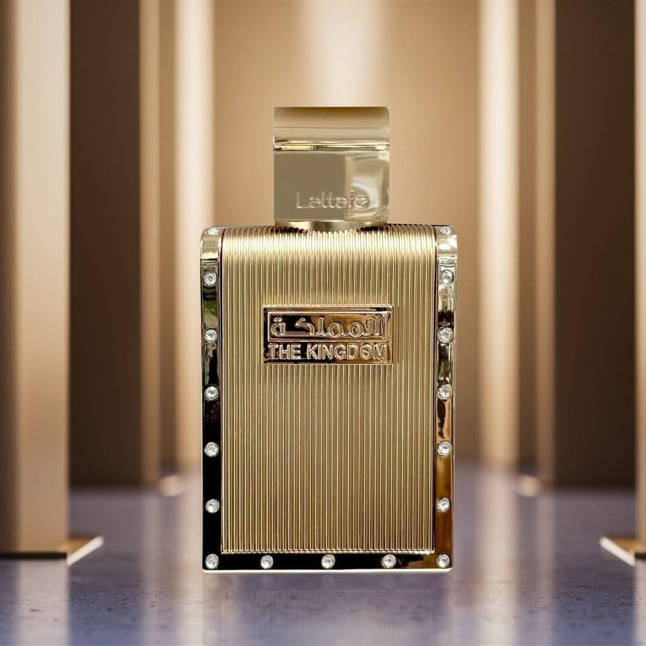 Lattafa The Kingdom for Men Eau De Parfum spray 100ml bottle with elegant packaging and cap, showcasing a luxurious fragrance.