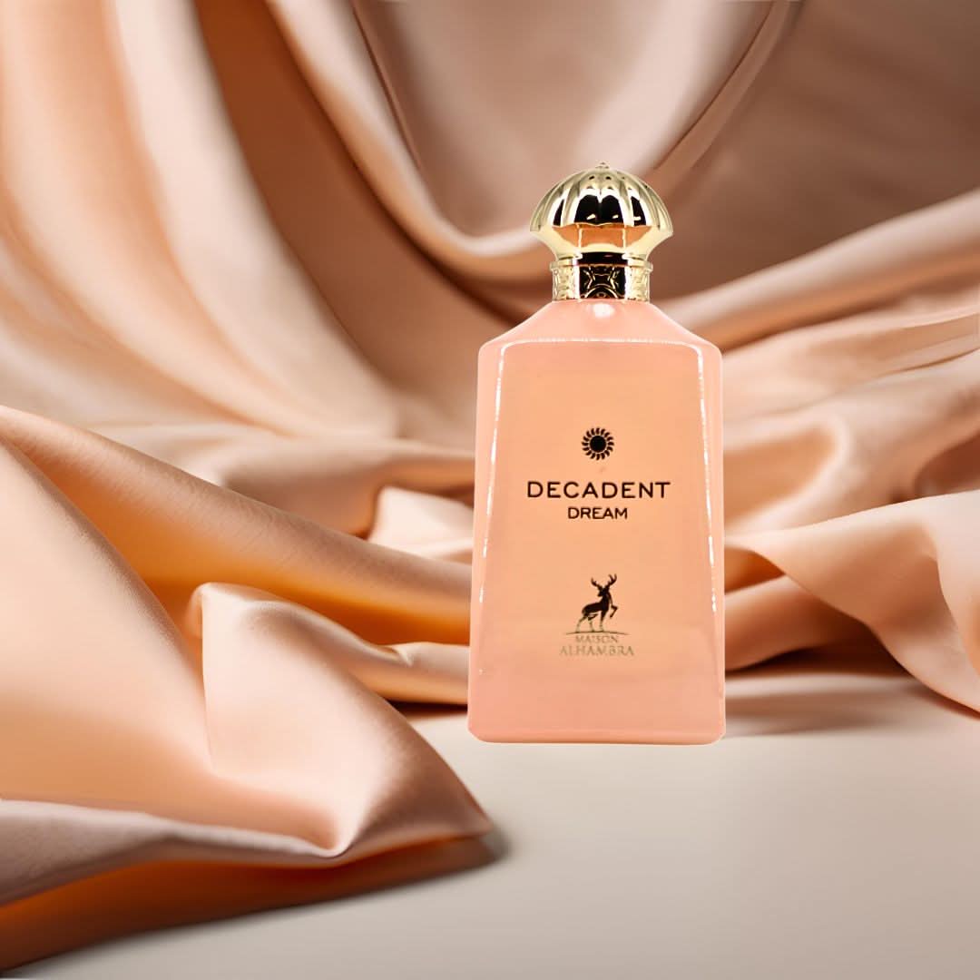 Maison Alhambra Decadent Dream Eau de Parfum spray bottle with velvet pouch, 100ml, elegant and luxurious fragrance presentation.
