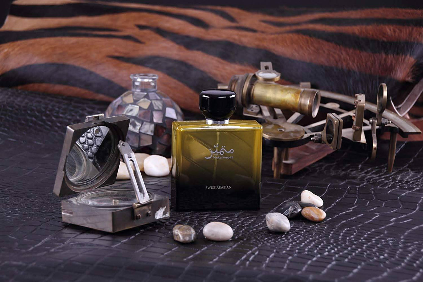Mutamayez for Men Eau De Parfum by Swiss Arabian, 100ML bottle with sleek design and metallic accents.