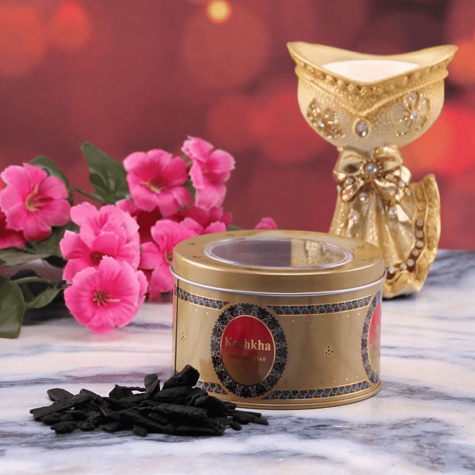 Swiss Arabian Kashkha Oud Muattar Bakhoor 24 GM jar, showcasing the decorative lid and traditional packaging of the fragrant incense product.