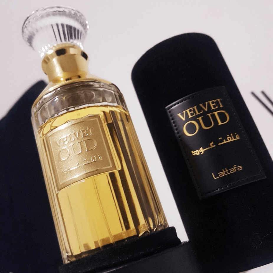 Lattafa Velvet Oud Eau De Parfum 100ML bottle with elegant packaging and dark velvet accents.