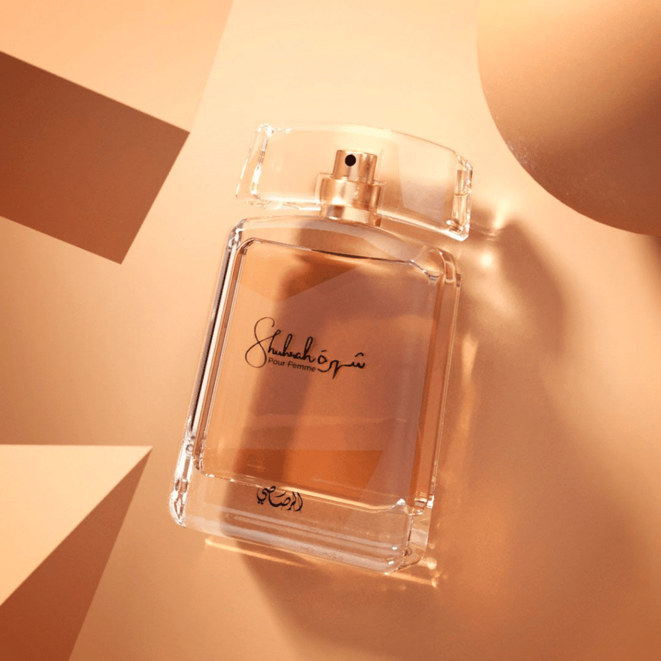 Rasasi Shuhrah Men & Women EDP bundle with two 90ml perfume bottles, showcasing elegant packaging and fragrance appeal