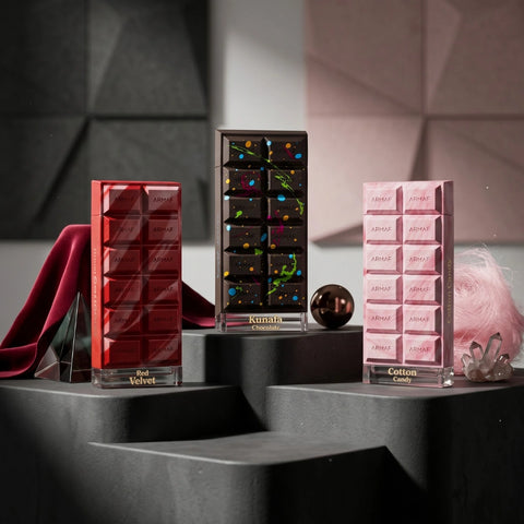 Bundle of Armaf Dubai Delicacy Red Velvet, Kunafa Chocolate, and Cotton Candy Eau de Parfum sprays in 70ml bottles, with packaging.