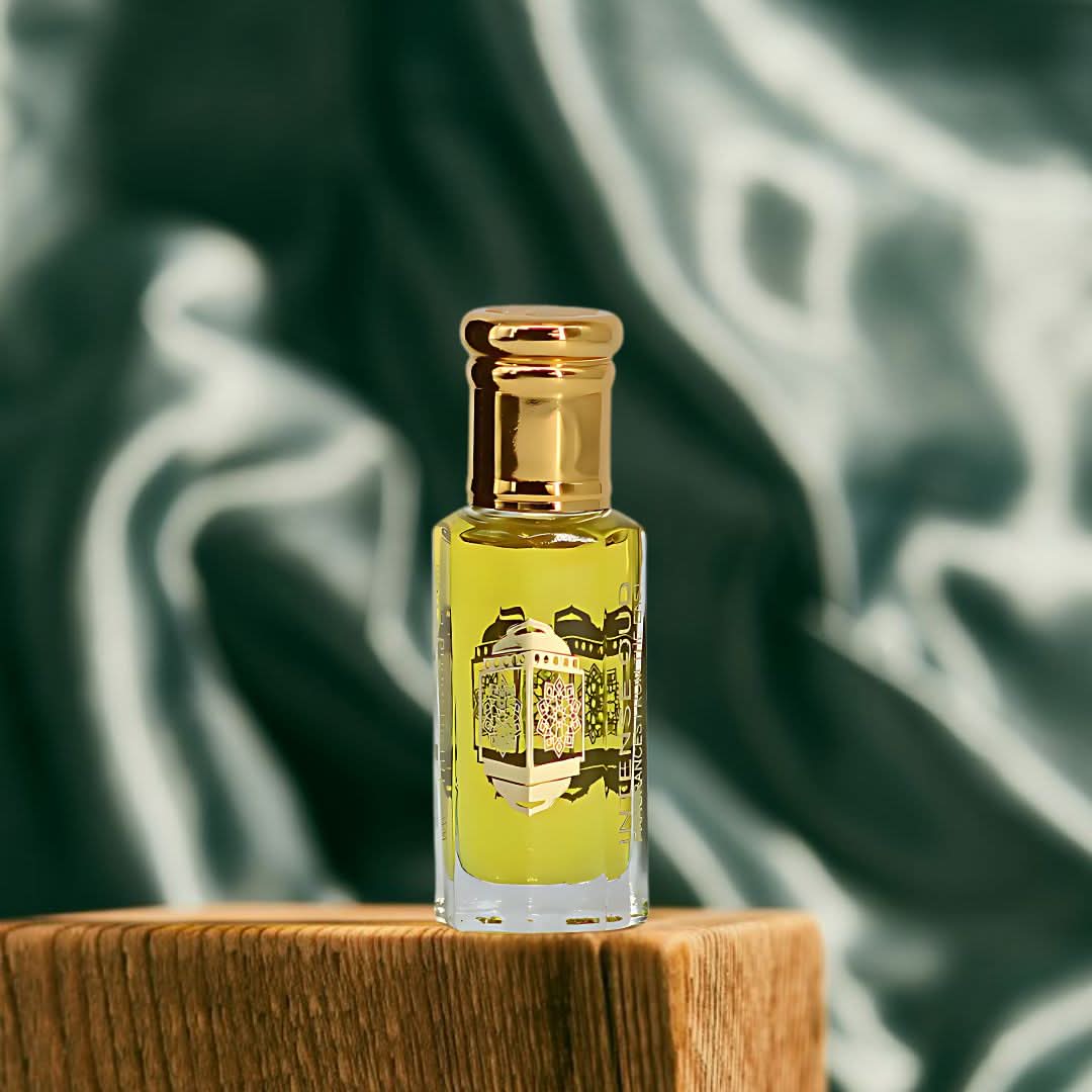 Yasmeen Al Arab Perfume Oil by Intense Oud in 12ml glass bottle with black gift box, featuring loose oil and elegant packaging.