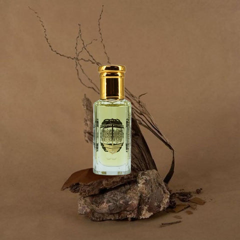Intense Oud Attar Al Wardat perfume oil in 12ml bottle with black gift box, featuring a clear glass bottle and elegant packaging.