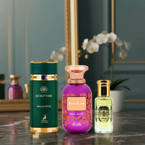 Rasasi perfume bundle featuring Sceptre Malachite by Maison Alhambra, Somow Al Rasasi Lavender Oud, and Rouje perfume oil.
