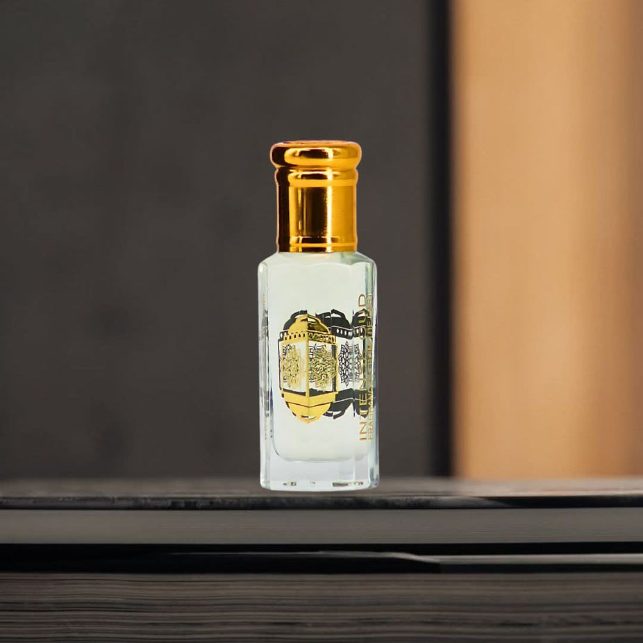 Intense Oud Khalab Perfume Oil 12ml in a black gift box, featuring a sleek loose oil bottle with elegant branding.