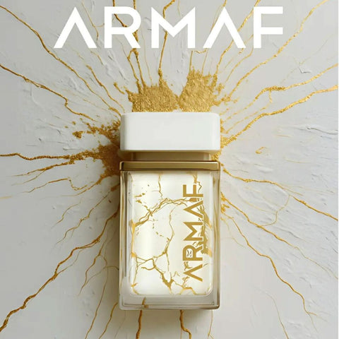 Armaf Perle D’or Eau de Parfum spray 75ml with velvet pouch, featuring a sleek glass bottle and elegant perfume design.