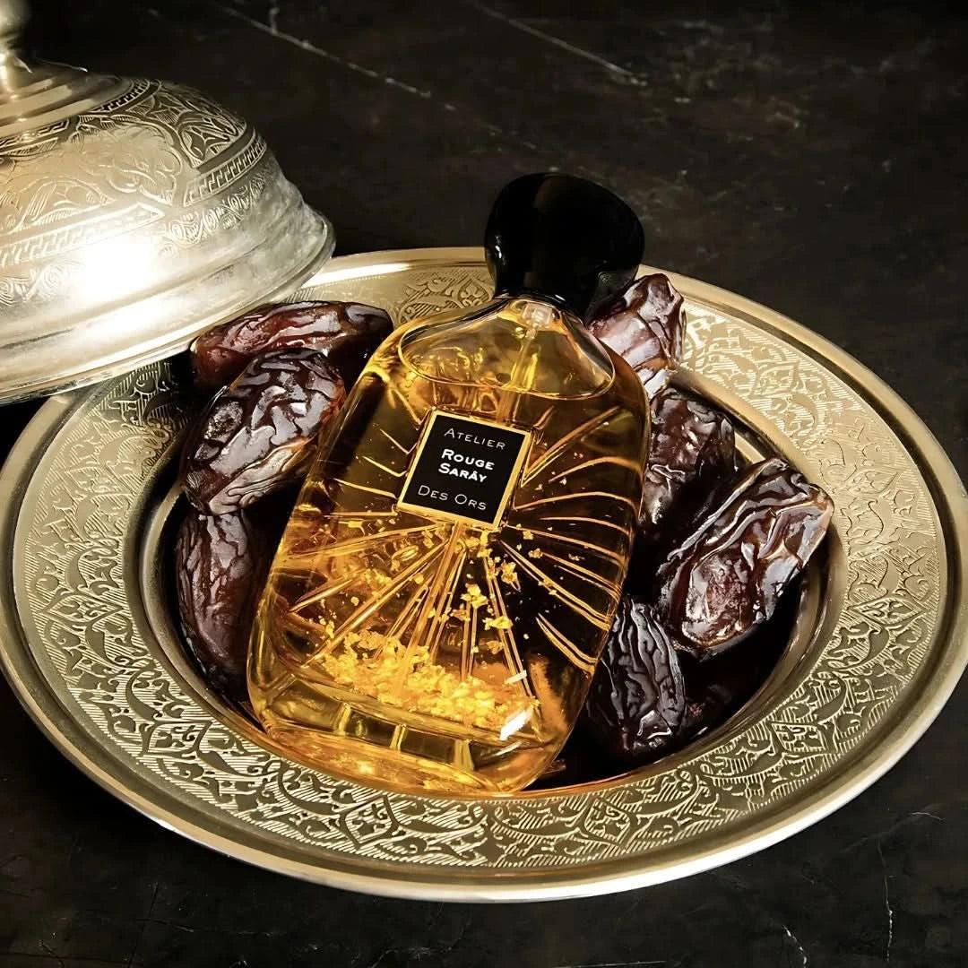 Rouge Sarây Eau de Parfum spray by Atelier Des Ores, featuring a sleek 100ml bottle with elegant design and deep red accents.