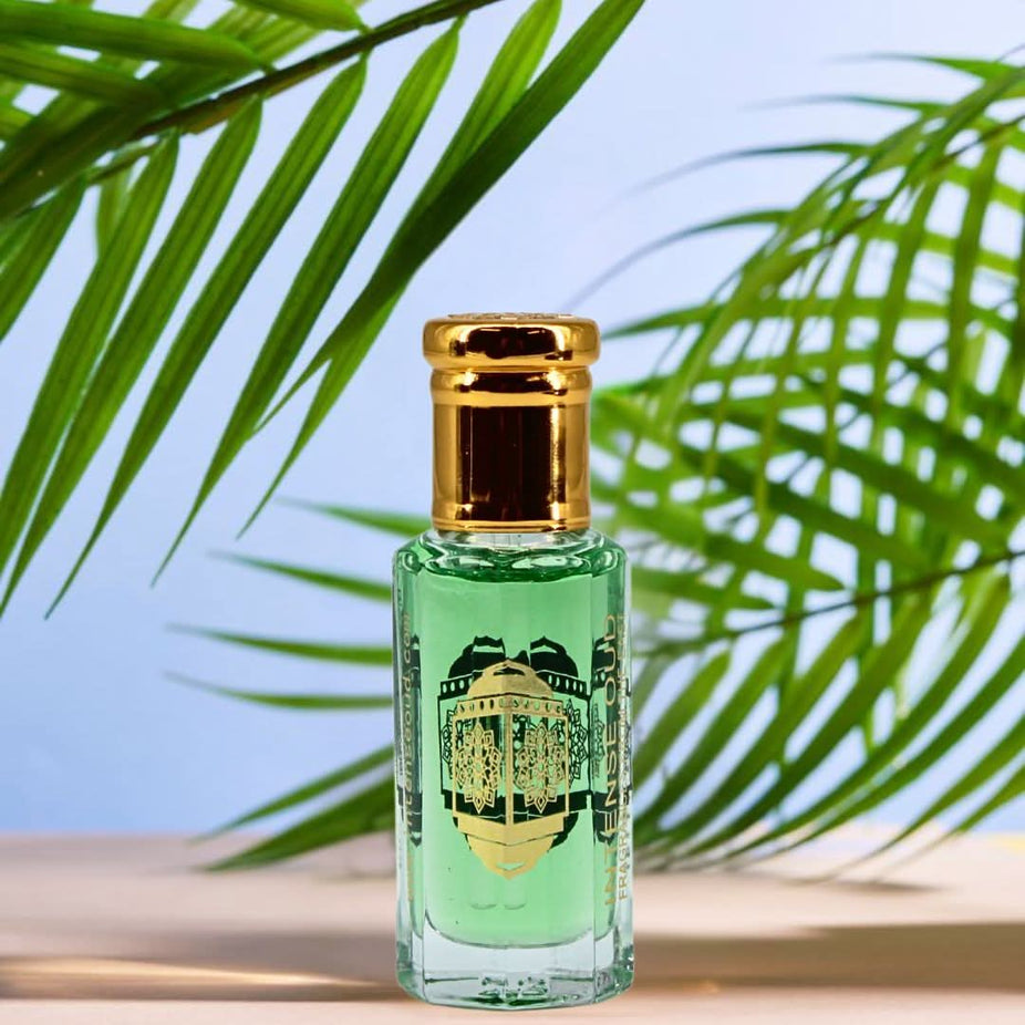 Intense Oud Fajr perfume oil 12ml in a black gift box, showcasing the loose oil bottle with elegant packaging.