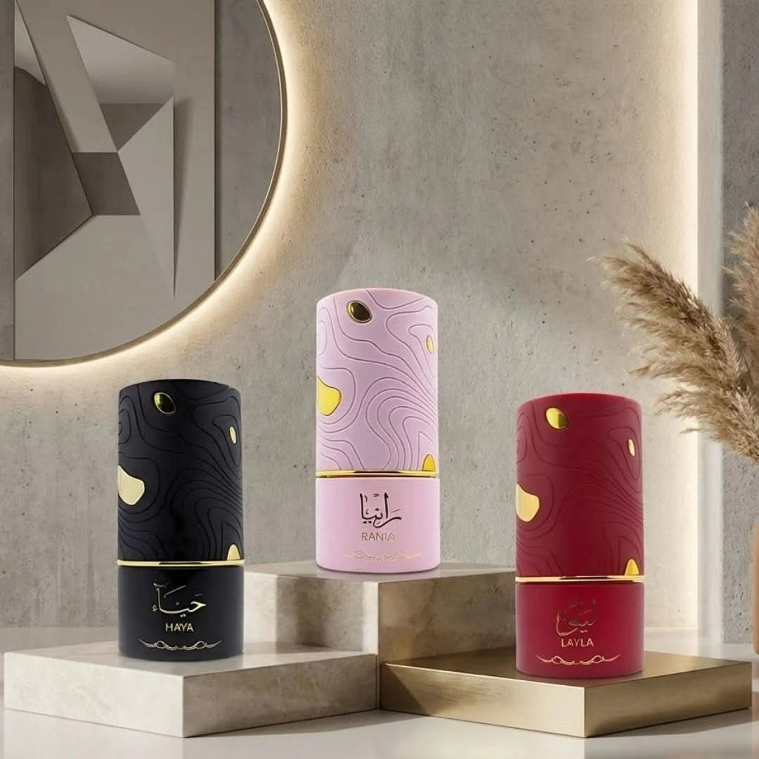 Al Absar Rania, Layla & Haya Eau de Parfum sprays bundle, 100ml each, featuring elegant glass bottles with colorful perfume liquids.