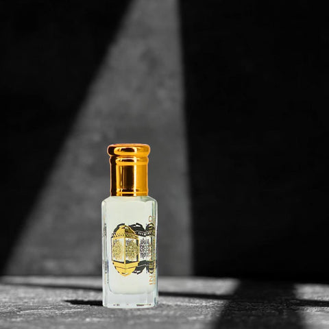 Intense Oud Tasfiq perfume oil 12ml in a black gift box, featuring a luxurious loose oil fragrance by Intense Oud.