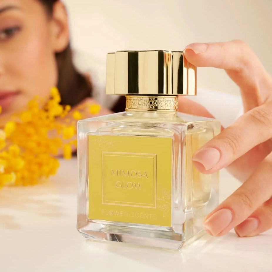 Flower Scents Mimosa Glow Eau de Parfum spray 65ml bottle, showcasing elegant packaging and floral design.