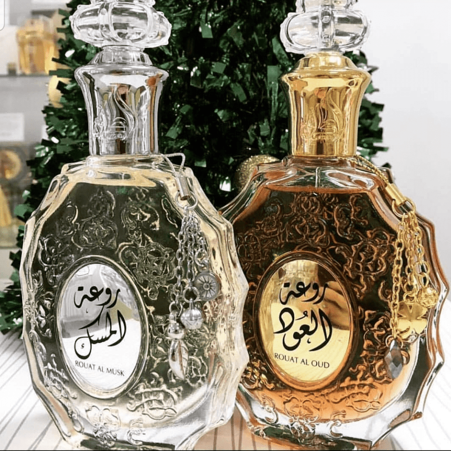 Rouat Al Oud Eau de Parfum spray by Lattafa, 100ml bottle with elegant packaging and the Oud fragrance visible.