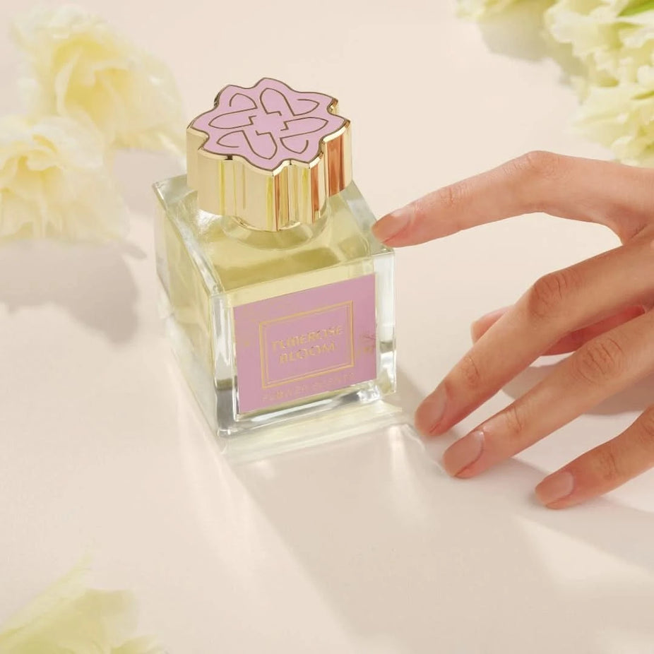 Flower Scents Tuberose Bloom Eau de Parfum Spray 65ml, elegant fragrance bottle with floral design and perfume spray nozzle
