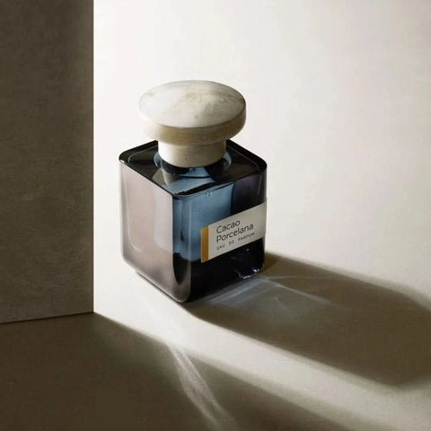 Atelier Materi Cacao Porcelana Eau de Parfum spray bottle, 100ml, with elegant packaging and a sleek glass design.