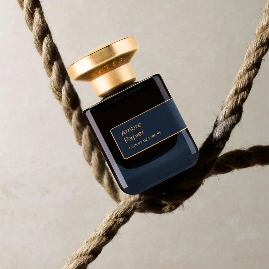 Atelier Materi Ambre Papier Extrait de Parfum spray bottle, 50ml, elegant design, showcasing the luxurious fragrance packaging.