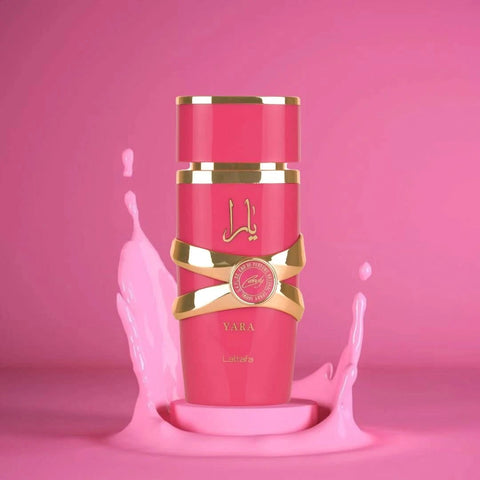 Lattafa Yara Candy Eau de Parfum spray in a velvet pouch, 100ml bottle with elegant design and spray nozzle.