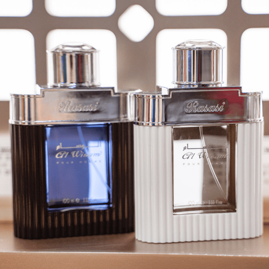Bundle of Rasasi Al Wisam EDP for men, 100ml, featuring the daytime and evening fragrance bottles with elegant packaging.