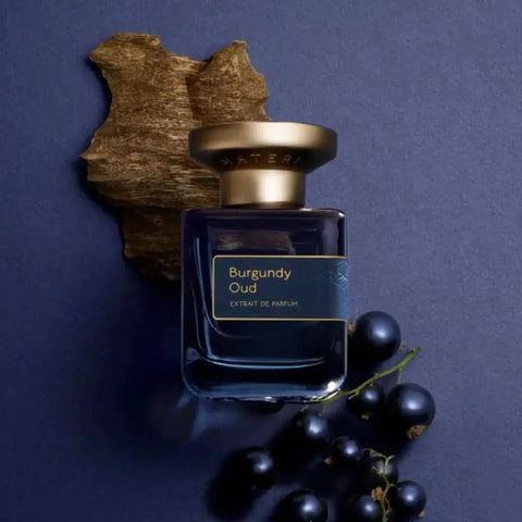 Burgundy Oud Extrait de Parfum Spray by Atelier Materi, 50ml, showcasing the elegant perfume bottle with deep burgundy color.
