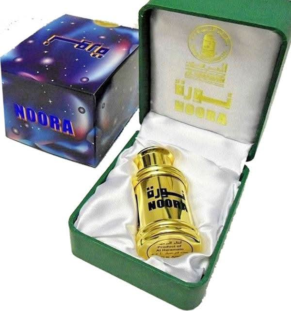 Al Haramain Noora perfume oil in a 12ml glass bottle, with elegant design and a golden cap, showcasing luxurious concentrated perfume oil.