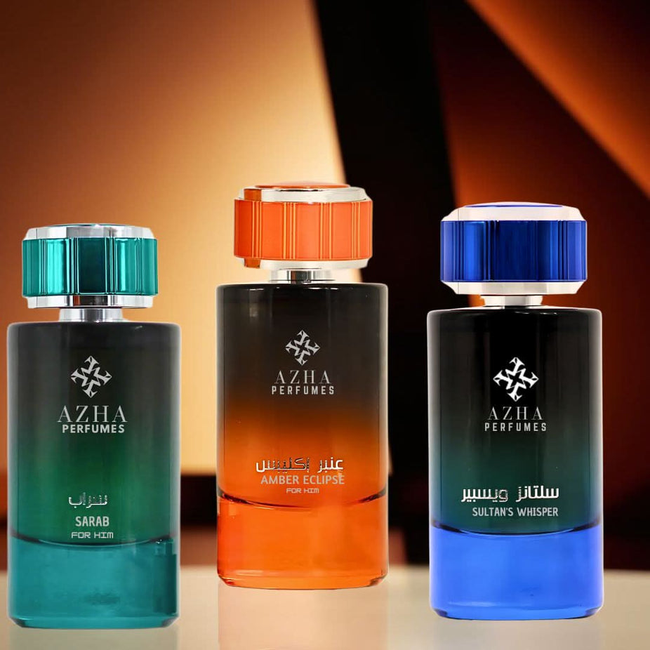AZHA Sultan's Whisper, Amber Eclipse, and Sarab for Him Eau De Parfum collection bottles in 100ml sprays, elegant and stylish packaging.