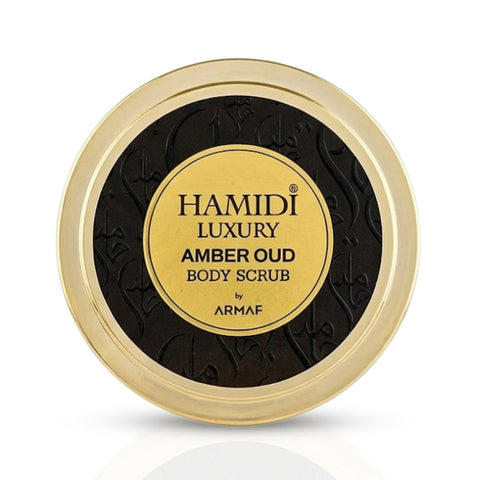 Hamidi Luxury Amber Oud Body Scrub in 250ml jar with creamy amber-colored scrub visible, featuring elegant packaging.