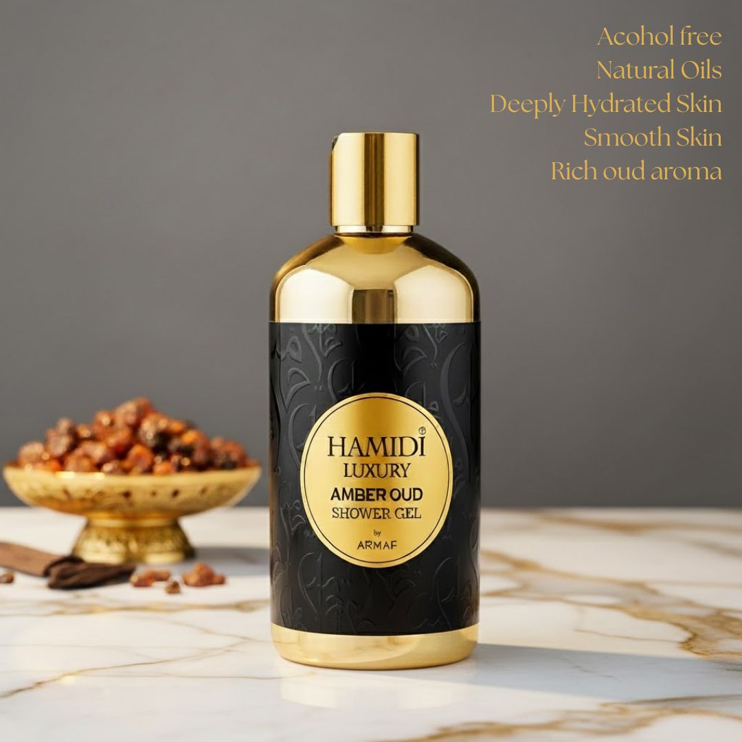 Hamidi Luxury Amber Oud Shower Gel 500ml bottle with amber-colored liquid and elegant packaging, showcasing a premium fragrance product.