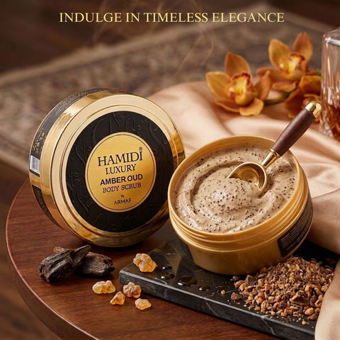Hamidi Luxury Amber Oud Body Scrub 250ml features a jar with a rich amber-colored scrub and elegant labeling.