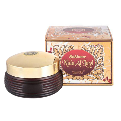 Surrati Bakhoor Nida Al Layal, 70 GM, aromatic traditional incense with floral and woody scent, in a decorative container.