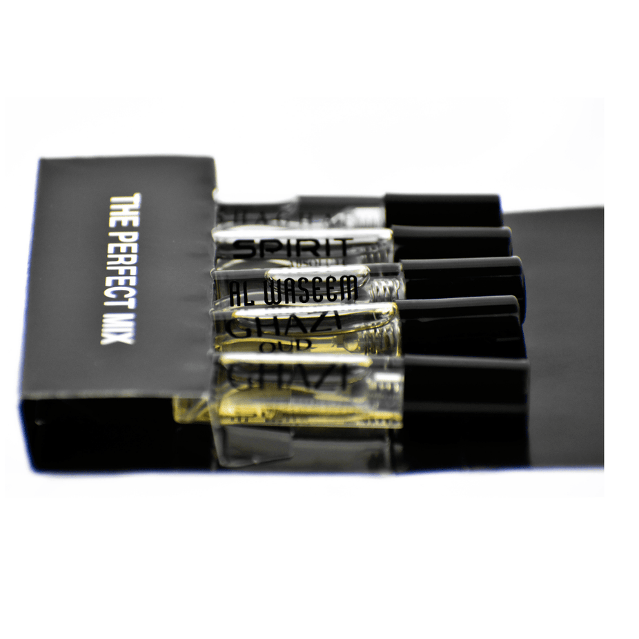Set of five Swiss Arabian fragrance samples including Ghazi, Oud, Spirit Absolute, Al Waseem, and Shaghaf Men.
