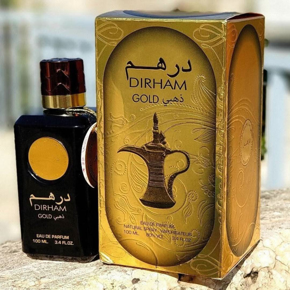 Ard Al Zaafaran Dirham Gold EDP unisex perfume bottle, 100mL, featuring a luxury fragrance with elegant gold packaging.