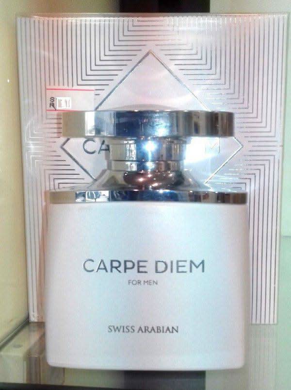 Swiss Arabian Carpe Diem for Men EDT 100ml bottle, sleek design, and fragrance details visible in the image.