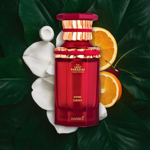 Hamidi Divine Cherry Eau de Parfum spray 100ml with velvet pouch, featuring a luxurious cherry scent and elegant packaging.