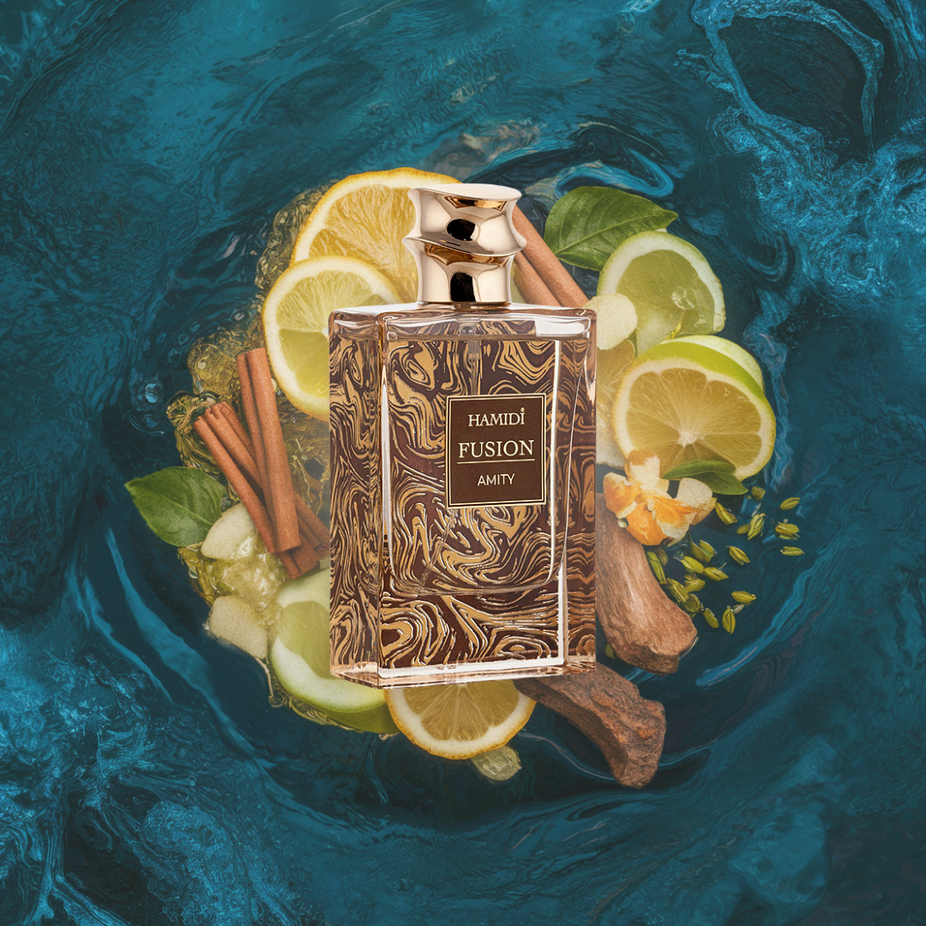 Hamidi Fusion Amity EDP spray 85ml with citrus scent, elegant glass bottle, showcasing the fragrance's fresh and vibrant design.