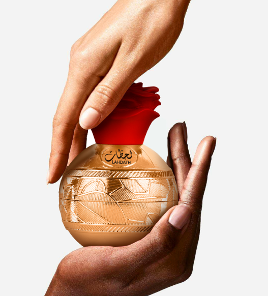 Lattafa Pride Lahdath EDP spray, 20ml travel size perfume, unisex fragrance for men and women, bottle with spray nozzle.